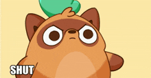 a cartoon cat with a green leaf on its head and the word shut underneath it