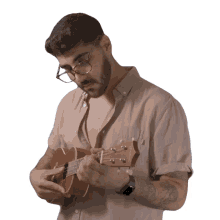 strumming ukulele
