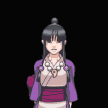 a pixel art drawing of a girl in a kimono