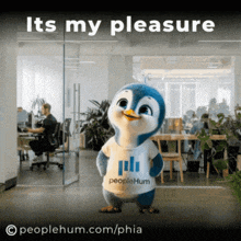 a penguin wearing a peoplehum t-shirt stands in an office