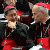 a man in a red hat has the word lje on his collar