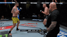 two men are fighting in a boxing ring and the ufc fight is being shown on oyo tires