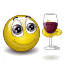 a smiley face is drinking a glass of wine with its tongue out .