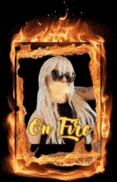 a picture of a woman in a fire frame with the words on fire