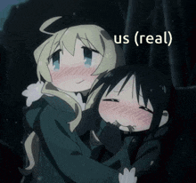 two anime girls hugging each other with the words " us ( real ) " below them