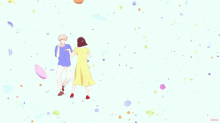a girl in a yellow dress is holding a man 's hand