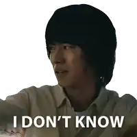 a man with a sticker that says " i don 't know "