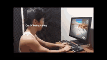a man is typing on a keyboard in front of a computer screen .