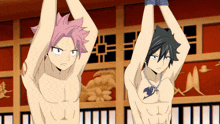 two anime characters hanging upside down with their arms up