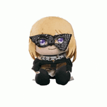 a stuffed doll with a mask on her face