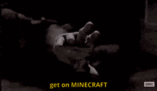 a man in a blue shirt with the words get on minecraft on the bottom