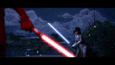 a person is holding a red light saber in a dark room