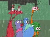 a group of cartoon characters are standing next to each other in the rain .