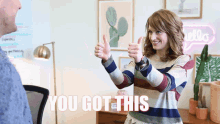 a woman giving a thumbs up with the words you got this written below her