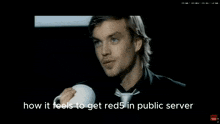 a man in a suit and tie talking to another man with the words how it feels to get red5 in public server