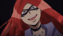 a woman with red hair is wearing a mask