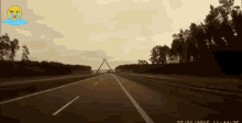 a screenshot of a highway with a crying face on it