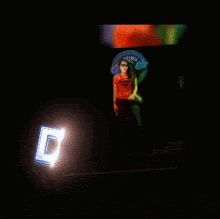 diva bi is written in blue letters on a dark background