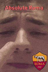 a poster for absolute roma shows a man covering his nose with his hand