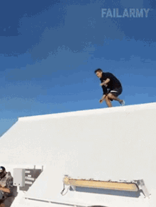 slide down wall land on table break table front flip parkour