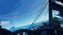 a screenshot of a video game shows a pirate ship in the ocean with a green sign that says ' pirate '