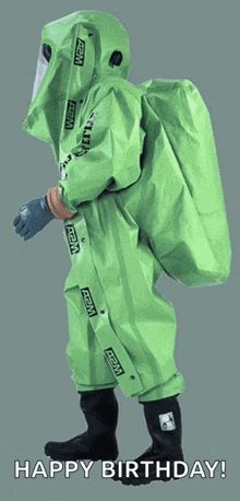 a person wearing a green suit that says vault elite