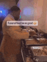 a man in a suit is preparing food for a funeral and the caption says funeral food be so good .