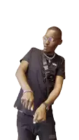 a man wearing glasses and a black shirt with the word alpha on the back