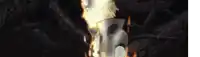 a close up of a person standing in the dark with a glowing face .