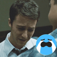 a man in a white shirt and tie is crying next to a crying smiley face