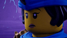 a close up of a lego character 's face with closed eyes