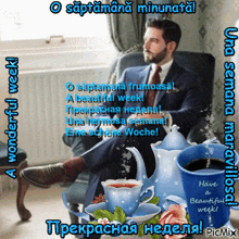 a man in a suit and tie sits in a chair with a cup of coffee