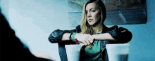 Katie Cassidy Chair GIF - Katie Cassidy Chair Look GIFs
