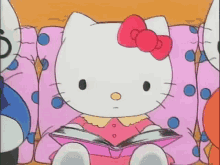 Hello Kitty Cute GIF - Hello Kitty Cute Reading GIFs