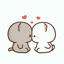 two cartoon cats are kissing each other with hearts coming out of their noses .