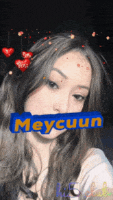 a woman 's face is displayed with the name meycuun on it