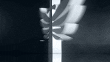 a black and white photo of a staircase going up