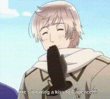 a man is blowing a kiss to cadence .