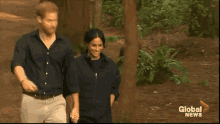 prince harry and meghan markle are walking in the woods