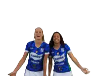 two women wearing blue shirts that say itambé mines