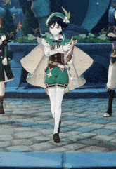 a girl in a green and white outfit holds a book
