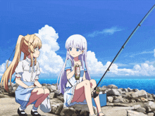 two anime girls are fishing on a rocky shoreline