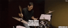 a man playing drums with the words those amen breaks from hakita be like