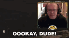 a man wearing headphones and glasses says ookay dude