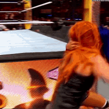 a wrestling match is being broadcasted on the next thing website