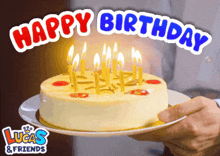 a person holding a birthday cake with the words happy birthday lucas & friends