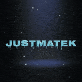justmatek is written in ice on a black background