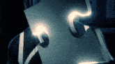 a puzzle piece with a light coming out of it in the dark