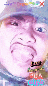 a man making a funny face with the words lob senggol gua gibt on the bottom