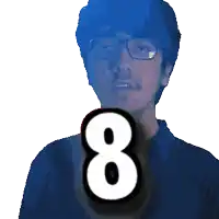 a man wearing glasses and a blue shirt has the number 8 in front of him
